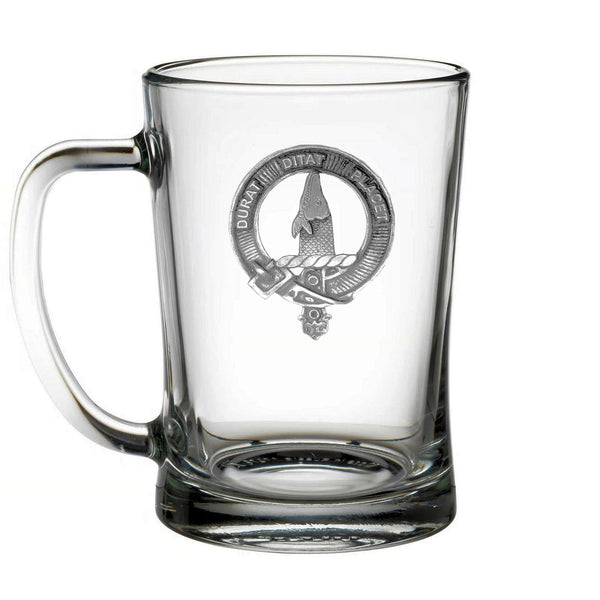 A clear glass mug with an embossed logo on it.