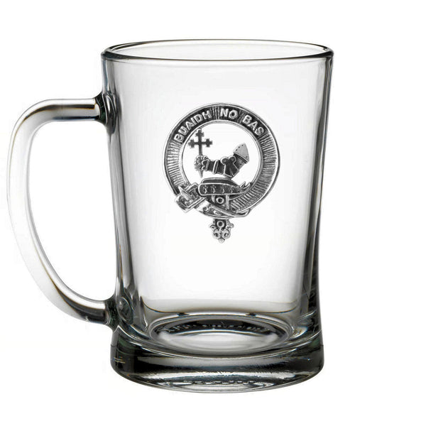A clear glass mug with a logo on it.