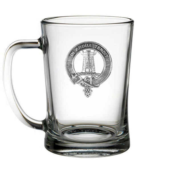 A clear glass mug with an embossed logo on it.