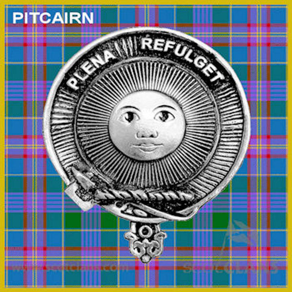 a metal badge with a sun-like design, surrounded by a plaid pattern.