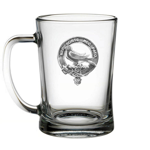 A clear glass mug with an embossed logo featuring a bird and some text.