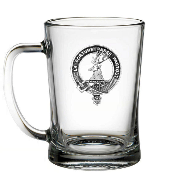 A clear glass mug with an embossed emblem featuring a deer and the text "La Fortune / Pass Partout" printed on it.