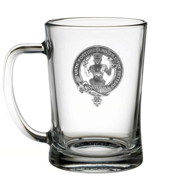 A clear glass mug with an embossed design featuring a figure and the text "Fortune and fortune the future".