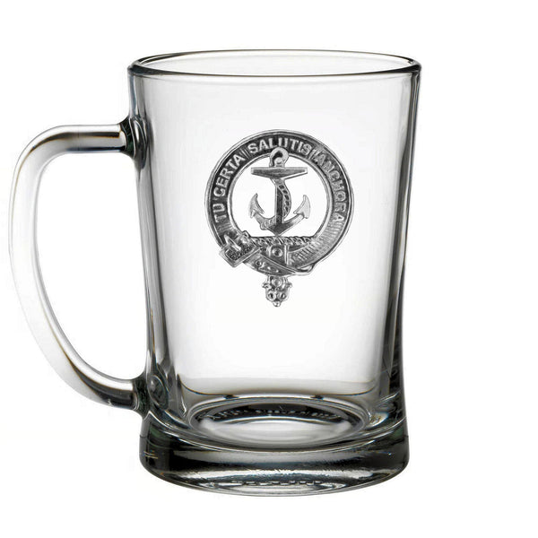 A clear glass mug with an embossed emblem featuring a ship anchor and the text "TU CERTA SALUTIS HANGORA" around the edge.