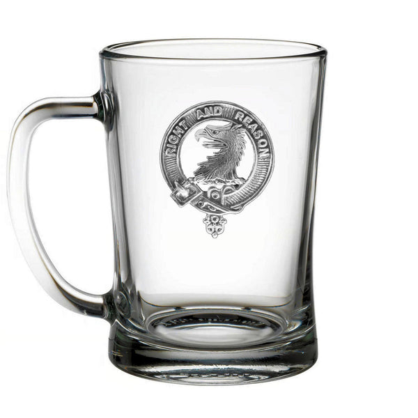 A clear glass mug with an embossed emblem featuring a bird and the text "Right and Reason" around it.