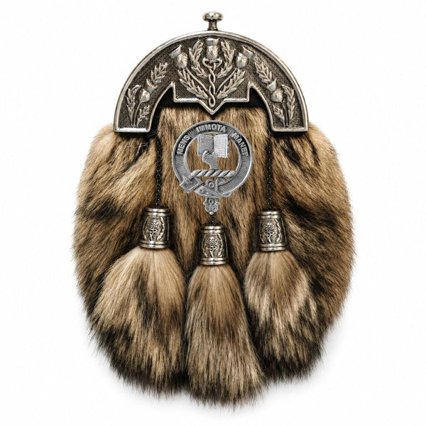 A decorative fur-trimmed kilt with metal tassels and a metal emblem.